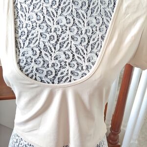 New tank sold on Amazon BRAND DCGJRAS SIZE XL 80% COTTON 20% SPANDEX